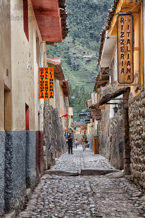 Inca, Ollantaytambo, Peru, cobblestones, multicultural, "on the road", "side street", signage, business, Quechua, commerce